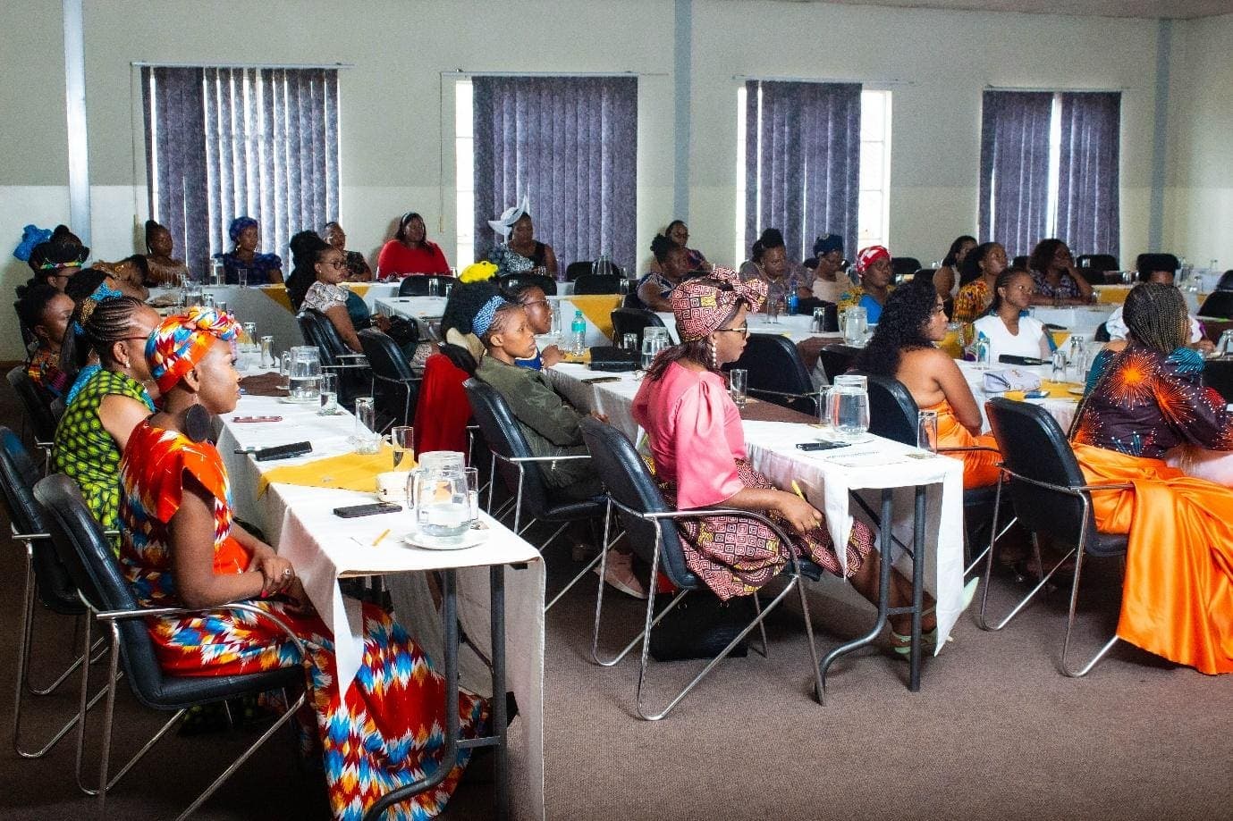 Women seated at tables during Makoti Indaba 3
